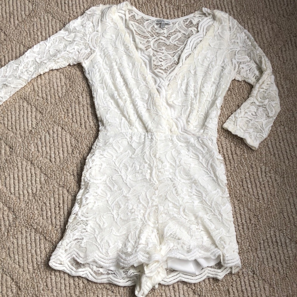 White quarter sleeve romper